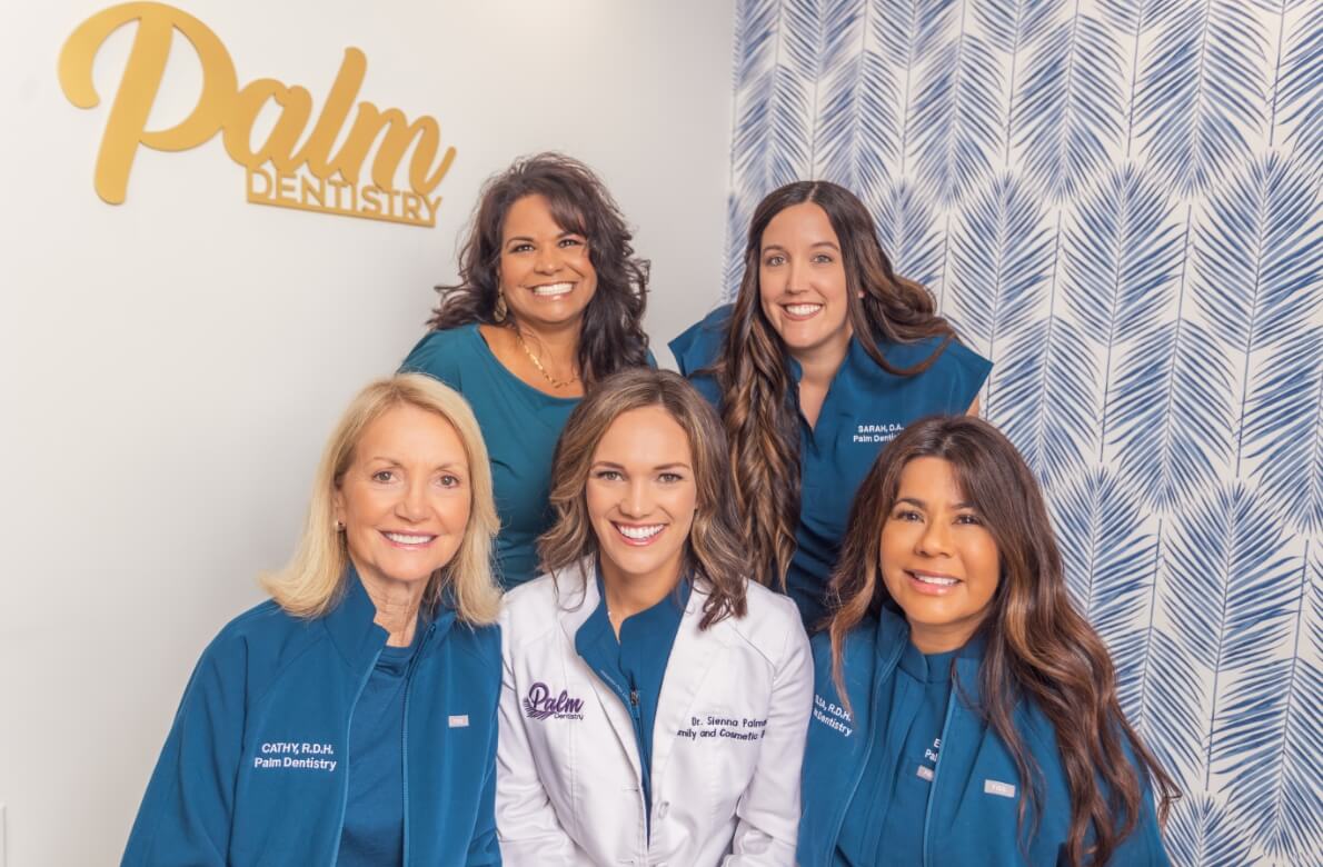 Smiling dental team members at Palm Dentistry in Mission Viejo