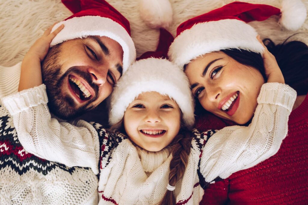 A smiling family together for the holidays